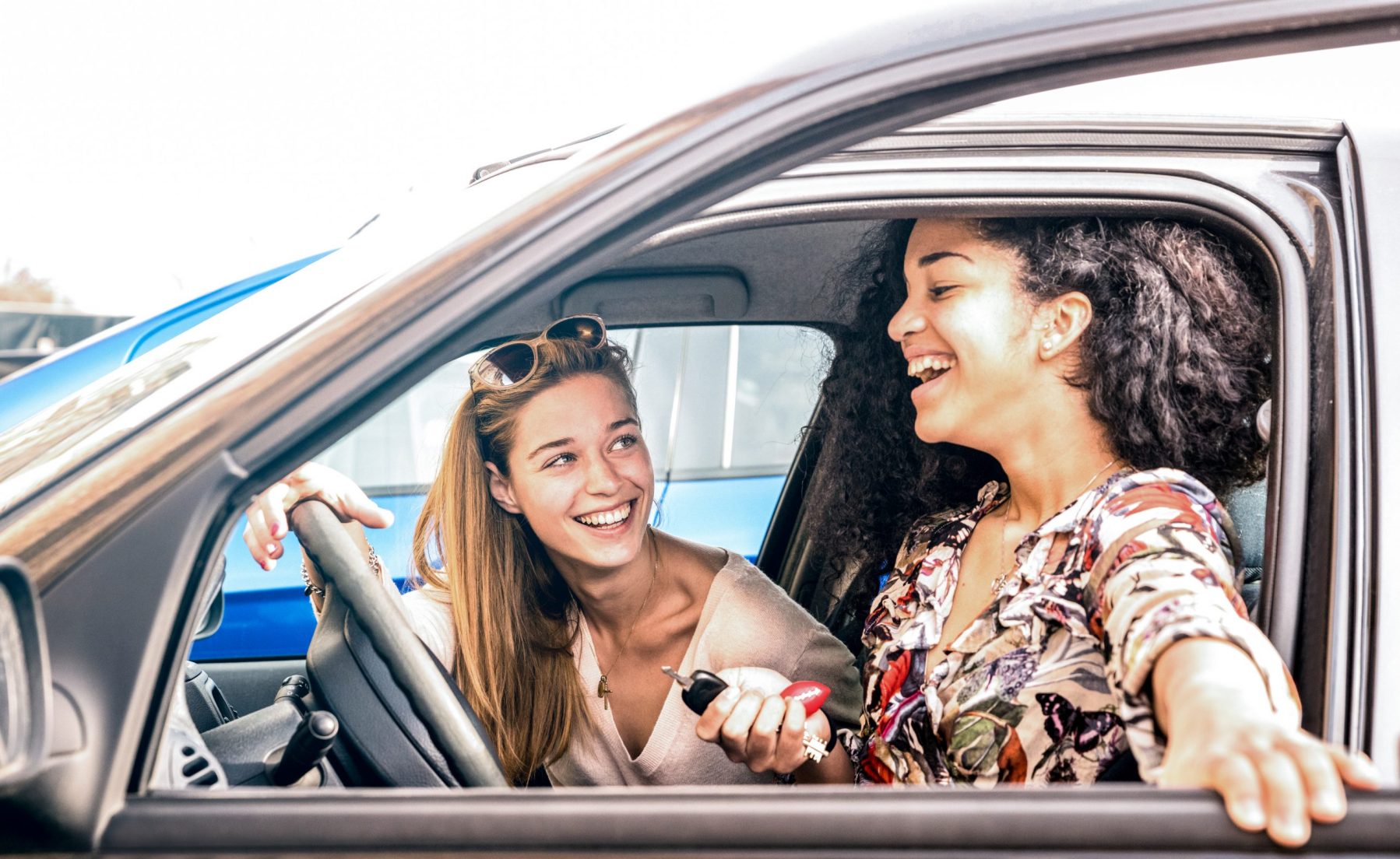 Young female best friends having fun at car roadtrip moment – Tr